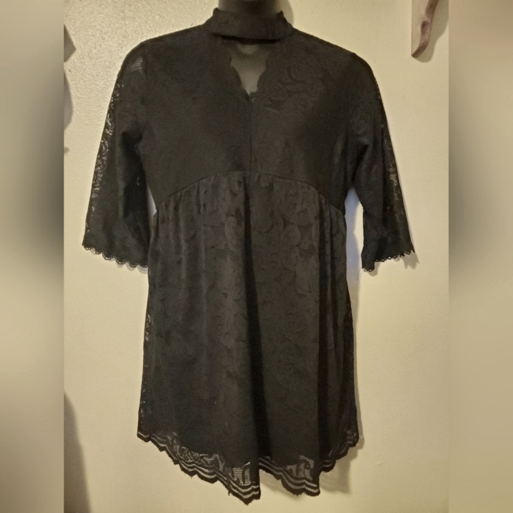 Black lacey baby doll dress with lace bell sleeves